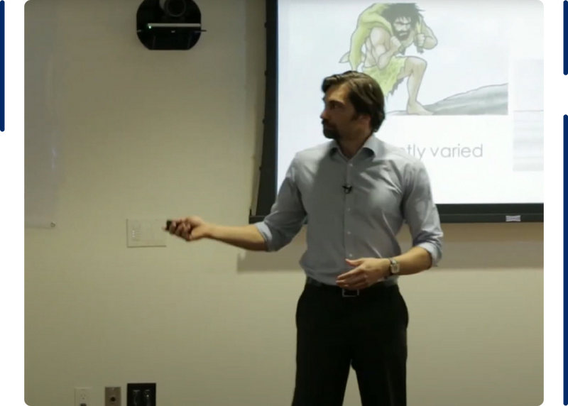Dr. Dave Clayton giving a health talk to an audience